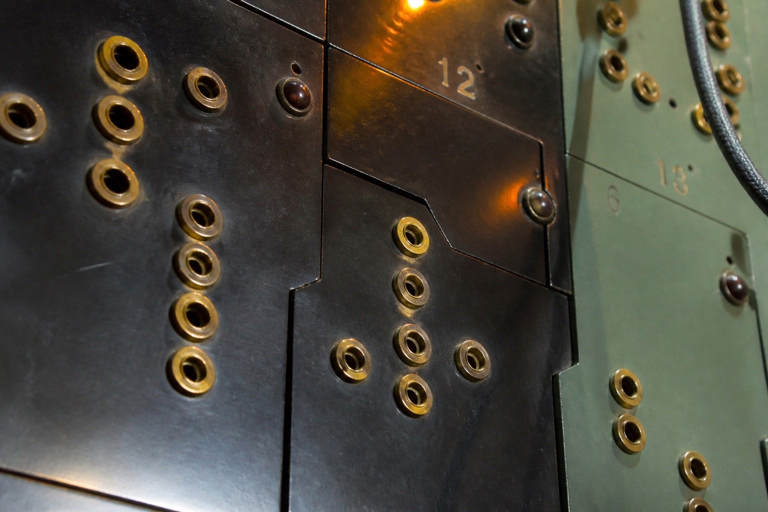Dark bakelite jack field with brass socket collars